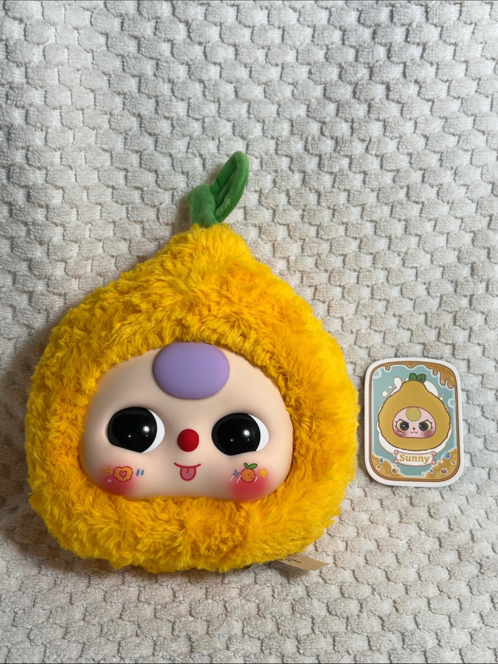 Baby Three Yellow Plush Fruit Vinyl Face Pouch - Sunny